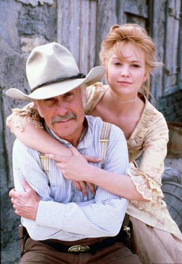Diane Lane shares a moment with Robert Duvall on the set of "Lonesome Dove," a timeless miniseries that solidified both actors' places in Western cinema history